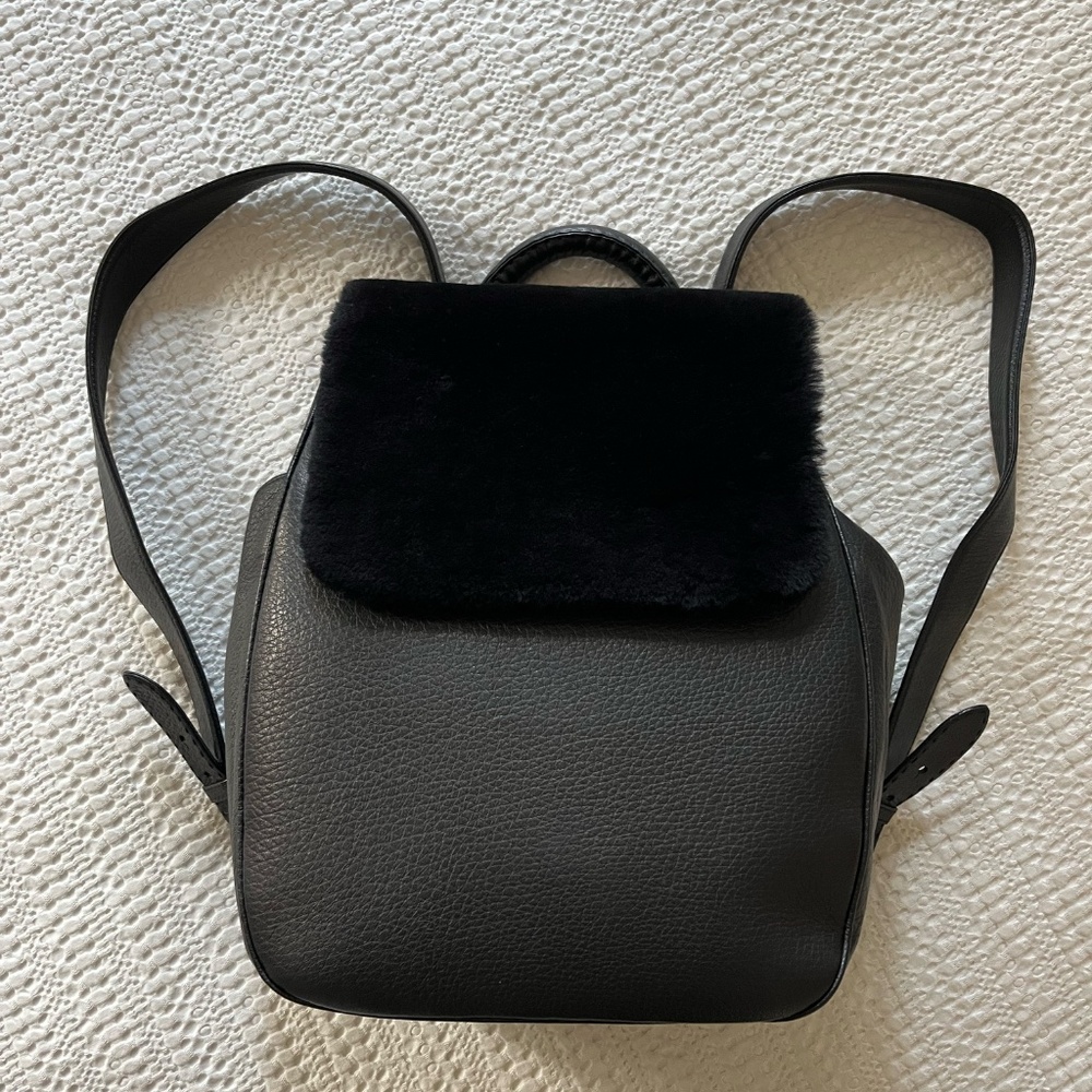 Perrin Paris black shearling flap backpack